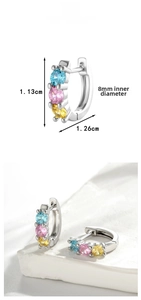 Detailed view of 8mm silver hoop earrings with blue, pink, and yellow zircons
