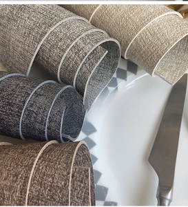Detailed texture view of waterproof linen-patterned leather placemats in four colors
