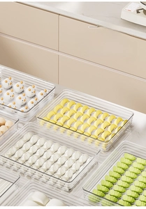 Multi-layer clear plastic dumpling storage box with grooved bottom for fridge