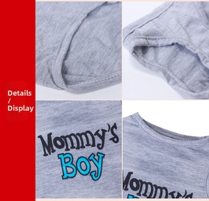 Detail of grey cotton pet vest featuring Mommy's Boy blue print and reinforced seams