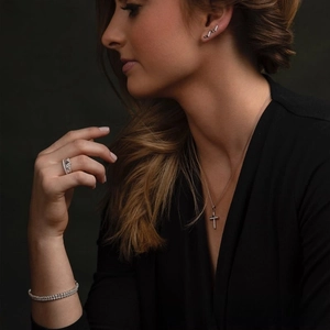 Close-up of sparkling zircon jewelry set with necklace, bracelet, ring and earrings