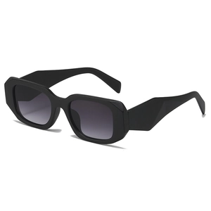 Fashionable square frame sunglasses with thick black geometric rims and gradient grey lenses