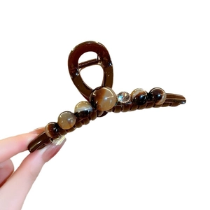 Elegant large tortoiseshell shark clip with marble beads and crystal centerpiece