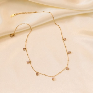 18K gold plated necklace featuring square and round pink gemstone charms on a fine bead chain