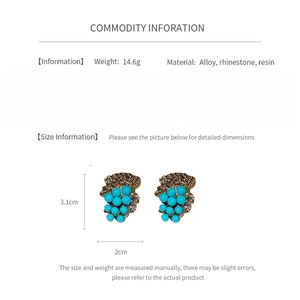 Detailed dimensions and weight specifications of vintage leaf-shaped stud earrings