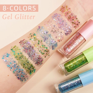 Set of 8 colors body and face glitter gel swatches on arm in clear tubes