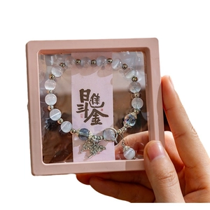 Pink PE film floating display box with butterfly beaded bracelet and decorative card