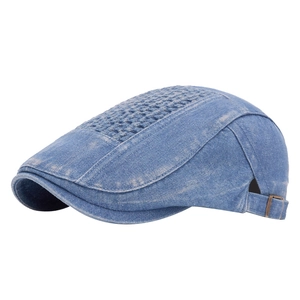 Vintage light blue washed denim flat cap with adjustable metal buckle on white background