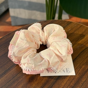French style plaid scrunchie with pink bow pattern and white lace pompom trim