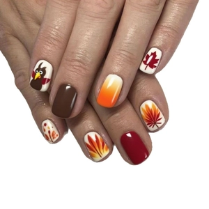 Short square Thanksgiving press-on nails featuring maple leaf and turkey festive designs