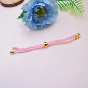 Close-up of pink Milan cord bracelet with 18K gold-plated adjustable slide clasp