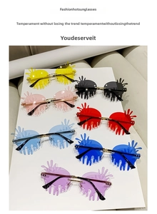 Flat lay of colorful rimless drip-shaped sunglasses with stylish liquid splash lenses