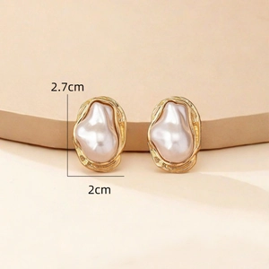 Elegant gold wrinkled metal earrings with irregular baroque pearls shown in 2.7x2cm size