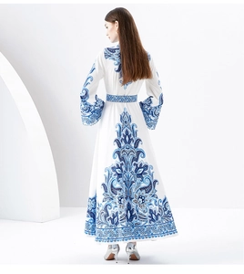 Elegant white maxi dress with blue palace style paisley prints and flared sleeve details