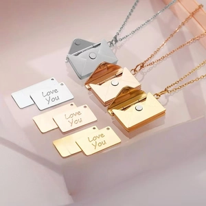 Envelope locket necklace in gold, silver, and rose gold with Love You engraved card