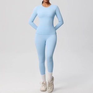 Ensemble de yoga bleu clair ajusté à manches longues avec legging taille haute pour fitness