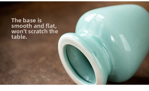 Detail of a smooth ceramic matcha whisk holder base with light blue glazed finish
