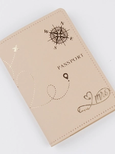 Beige PU leather passport cover with gold embossed compass and airplane design