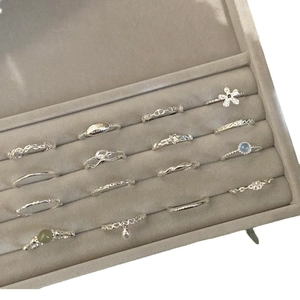 Set of 15 minimalist 925 sterling silver adjustable rings in a gray velvet jewelry box