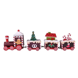 Detailed view of red wooden Christmas train with gingerbread man and festive decorations