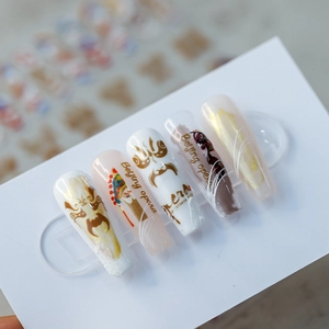 Beijing Opera themed nail stickers with facial masks and golden foil art design
