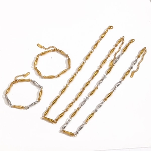 Minimalist two-tone stainless steel fish-shaped link necklace and bracelet jewelry set