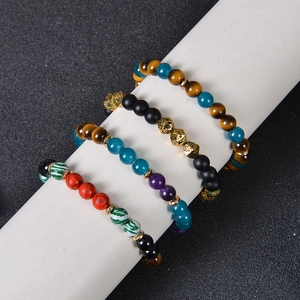 Tiger eye and crystal natural stone beaded fortune bracelet set with gold accents