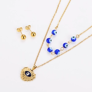 Gold layering necklace with blue evil eye heart pendant and matching ball stud earrings
