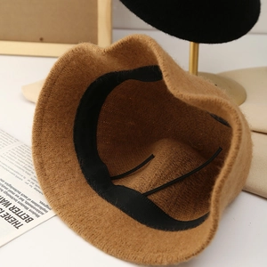 Inside view of a camel knit bucket hat with adjustable drawstring and sweatband