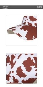 Detailed view of the cow print pattern and fine stitching on a mesh baseball cap