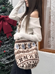 Winter plush bucket bag with blue snowflake pattern and brown geometric textures