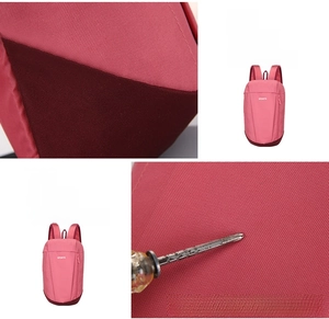 Pink sports backpack detail with reinforced double stitching and waterproof fabric