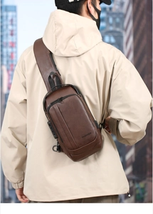 Brown leather sling bag for men with anti-theft lock and external USB charging port