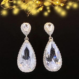 Elegant silver teardrop earrings with sparkling crystals and pavé cubic zirconia setting