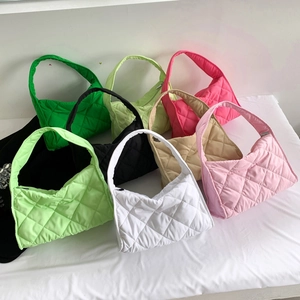 Quilted nylon shoulder bags displayed in vibrant colors including pink and green