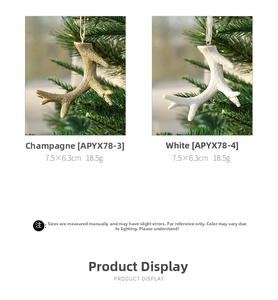 Detail view of champagne and white reindeer antler resin ornaments for Christmas tree decor