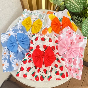 Striped pet dog and cat dress collection with large bows and floral fruit prints