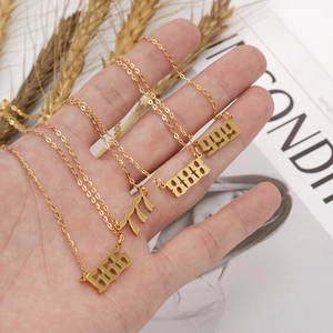 Detail of 666, 777, 888, 999 angel number necklaces in gold plated stainless steel