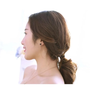 Minimalist Roman numeral stud earrings and gold necklace set for women shown on model