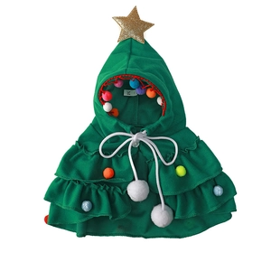 Christmas tree pet cloak for dogs in forest green knit fabric with colorful plush pom-poms
