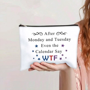 Detailed view of canvas makeup bag with humor slogan print and black zipper closure