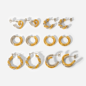 Detailed set of six gold and silver mixed geometric earrings with minimalist metal textures