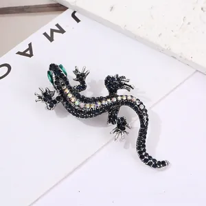 Vintage lizard brooch with deep blue rhinestones and antique silver finish for women