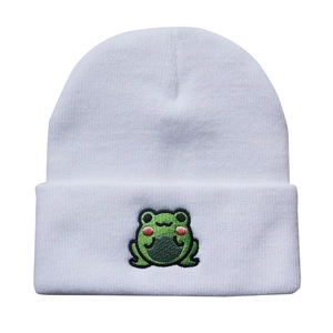 Winter white knit beanie hat for adults featuring a cute green frog embroidery