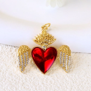 Vintage gold plated heart pendant with red enamel, crystal wings and crown top detail