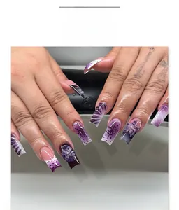 Detail of long square press-on nails with 3D purple flowers and wave art patterns