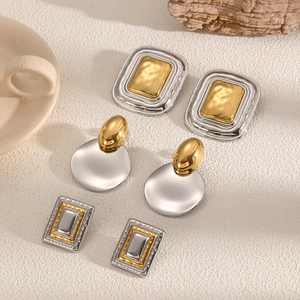 Three pairs of geometric gold and silver stainless steel earrings in rectangular and round shapes