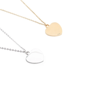 Minimalist heart pendant necklaces in gold and silver finish on white background
