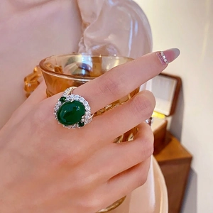 French vintage silver ring featuring large oval green gemstone and zircon accents