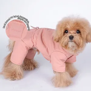 Thickened four-legged winter dog coat in dusty pink with leash ring and PU label
